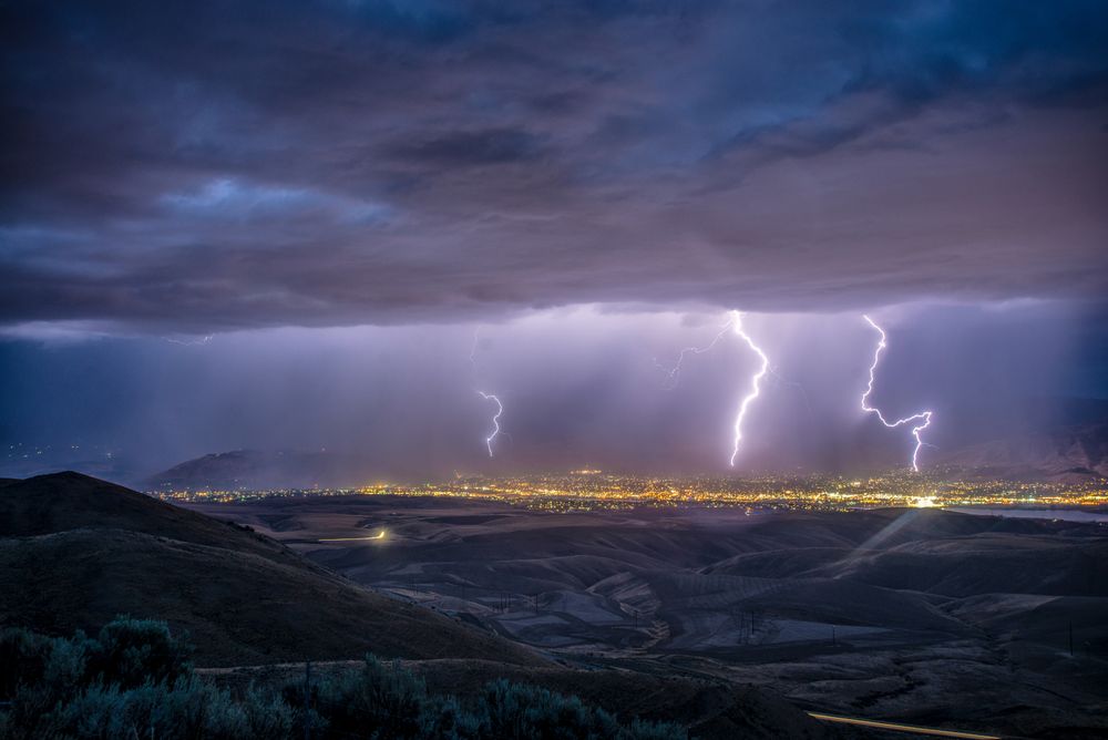Thunders over a city during nighttime