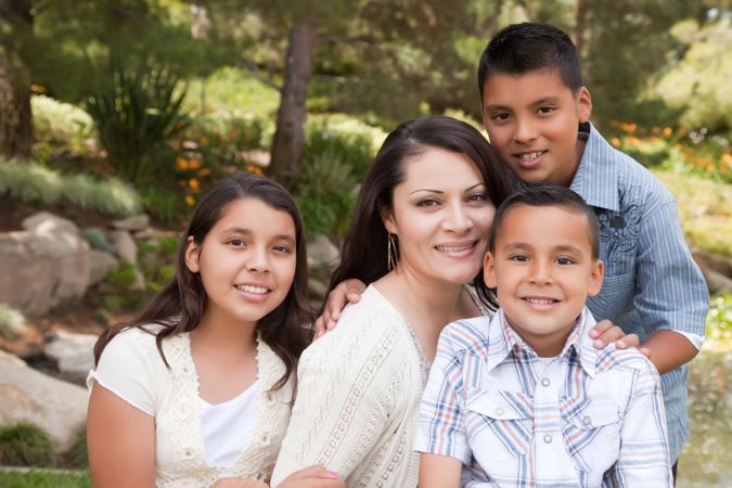 Happy Mother and Children in the Park