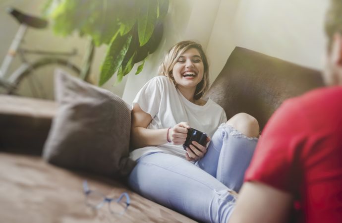Couple on sofa talking