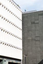 Two walls of different building meeting corner