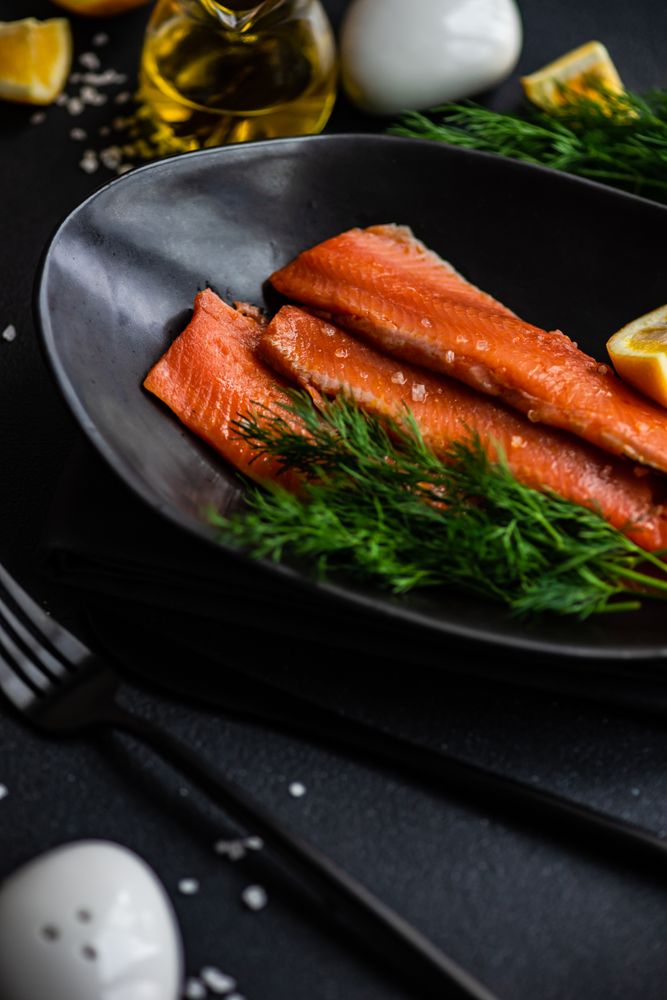 Herring fish with dill and lemon served on plate