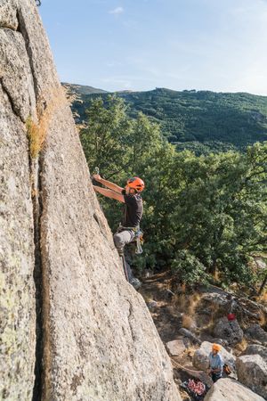 Man climbing a rock