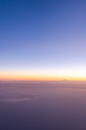 View of Caucasus mountain on the horizon line during sunrise
