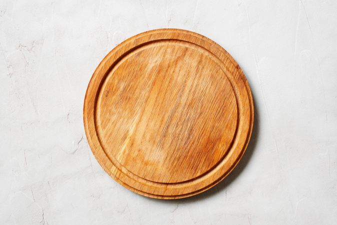 Plain wooden circular cutting board