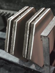Hexagonal tiles on rack in row