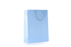 Blue paper bag isolated on blank background