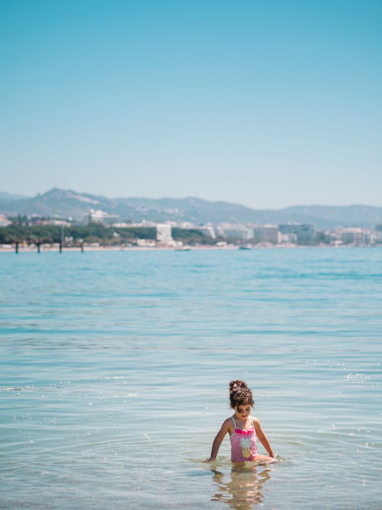Cheerful bathing in warm sea