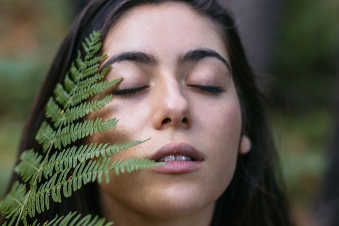 Portrait of a young woman in the forest