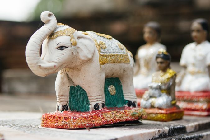 Elephant statuette with golden ornament