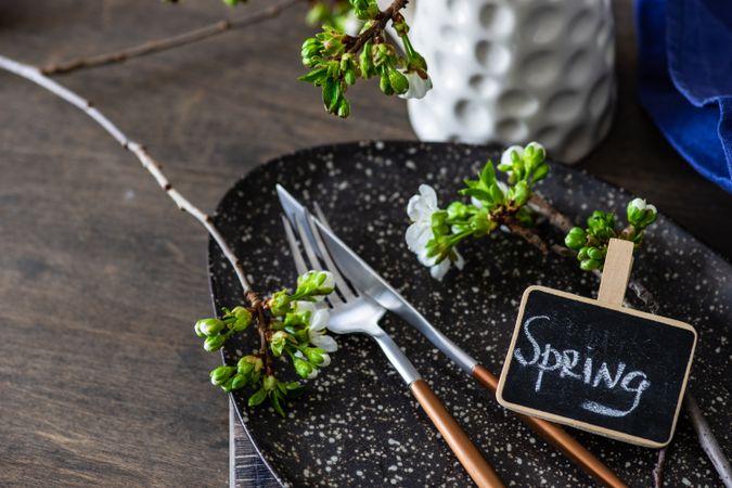 Spring table setting with plate with delicate buds