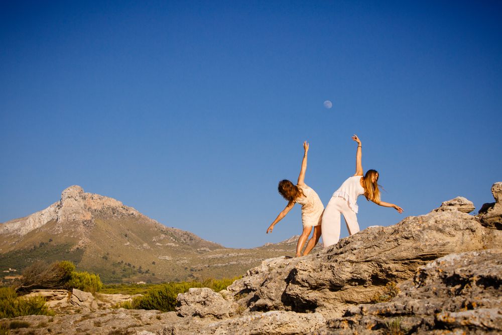 Young women posing on stones