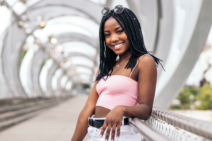 Portrait of a Black young woman enjoying the summer in the city
