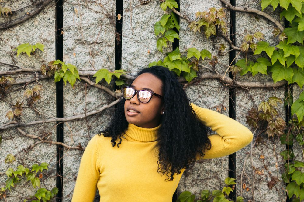 portrait of a Black fashion woman with sunglasses