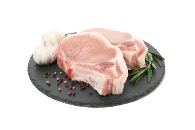 Raw meat for steak and ingredients isolated on light background