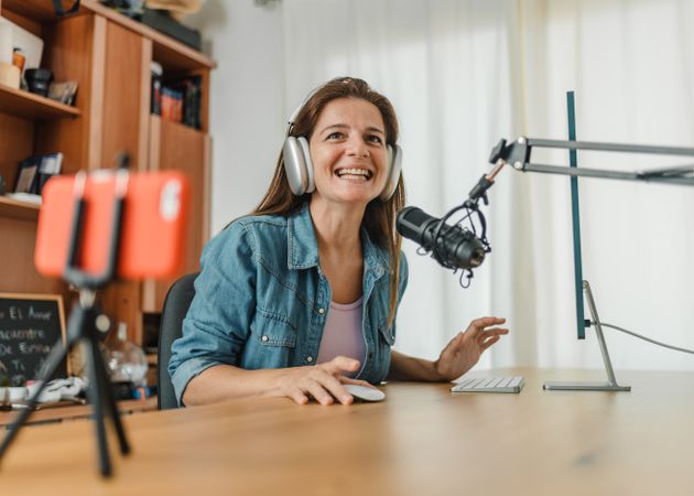 Influencer shooting video and recording podcast