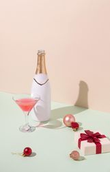 Scene of Christmas decoration, champagne and gift box