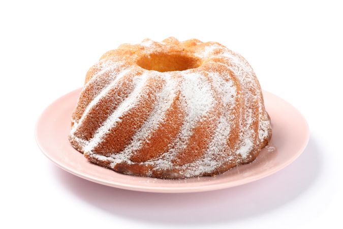 Cake with powdered sugar isolated on plain background