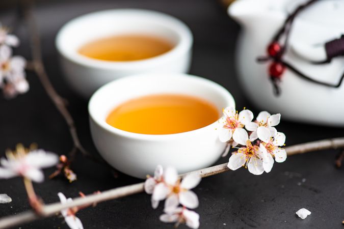 Cups of tea with floral decor