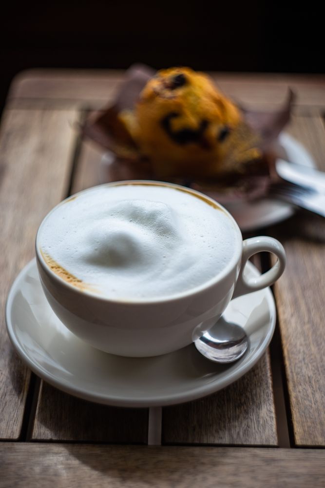 Cup of frothy morning cappuccino