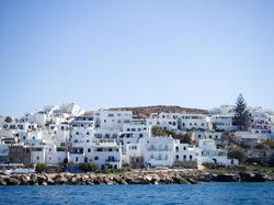 Light coloured houses with blue windows and doors