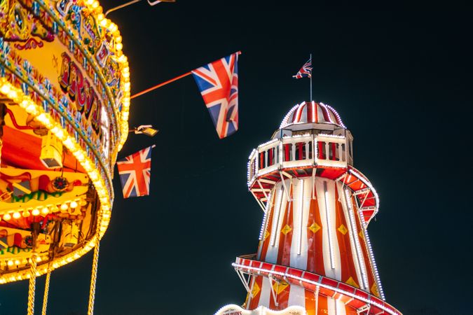 Illuminated rides in amusement park
