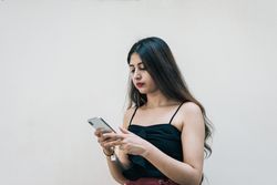 Woman holding cellphone