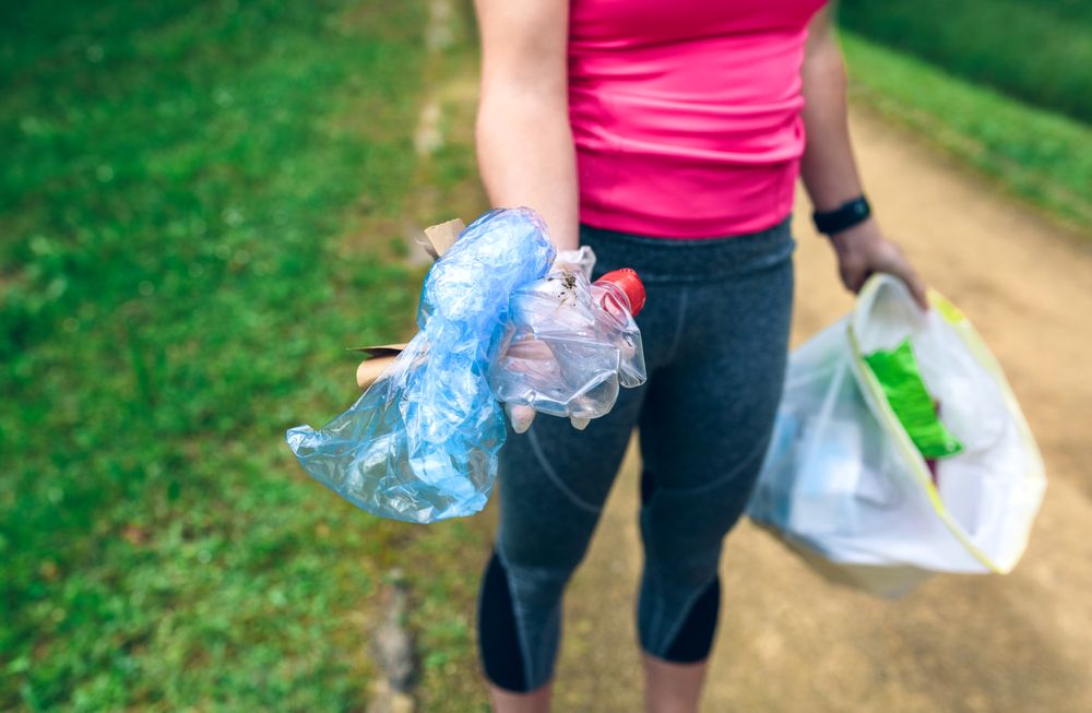 Woman showing garbage
