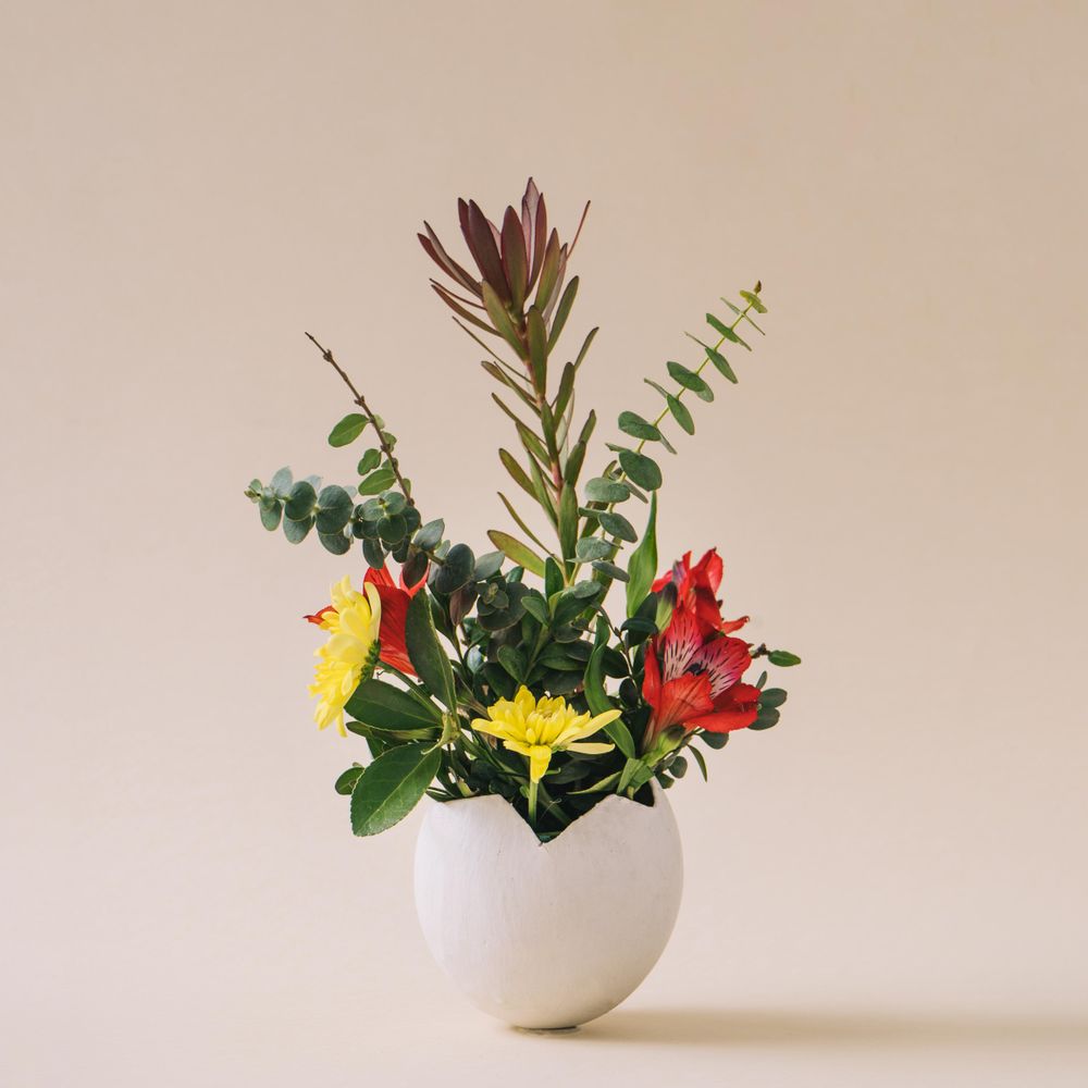 Easter egg shell with flowers and leaves