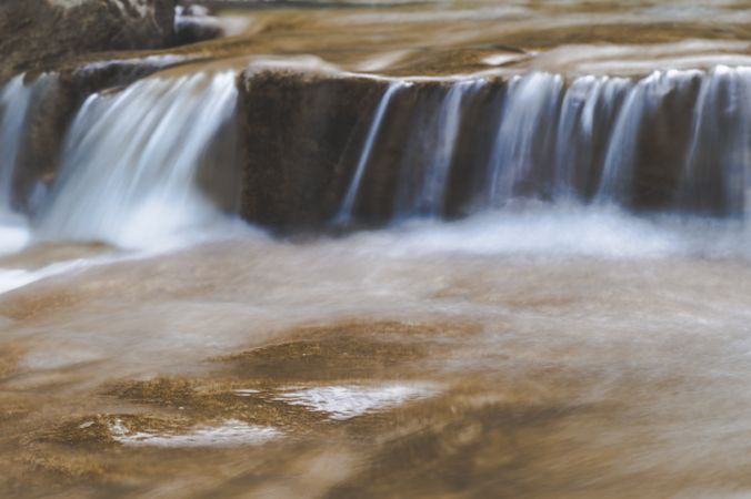 Small waterfall near pond
