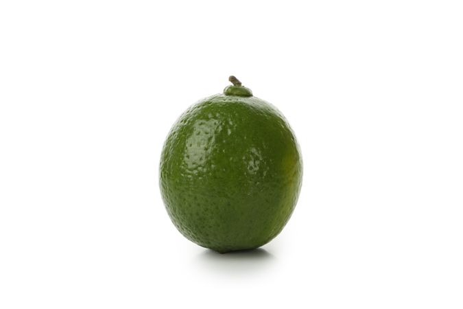 Fresh green avocado isolated on blank background