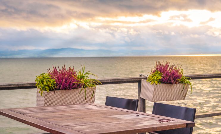 Outdoor table on lake shore