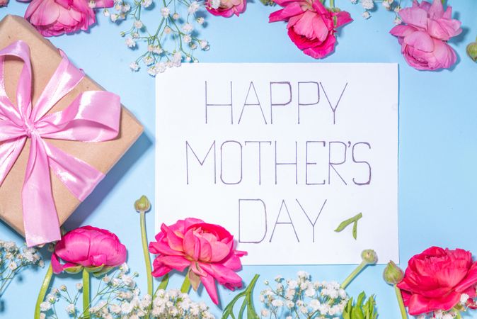 Mothers day gift and flowers background