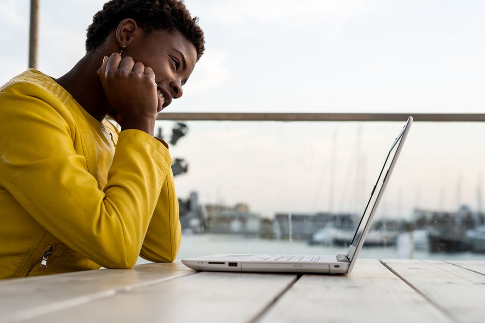 Female working on laptop at table