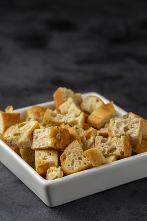Delicious crunchy croutons on the table.