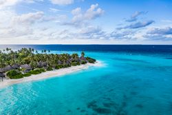 Drone footage of idyllic beach resort on island