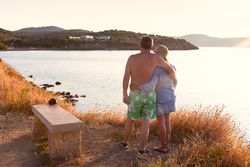 couple bonding and observing seascape