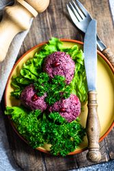Close up of traditional Georgian dish beet dish, pkhali with peppermill