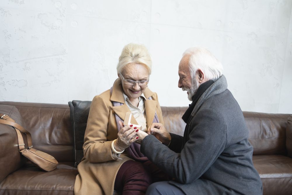 Mature man proposing to woman with ring
