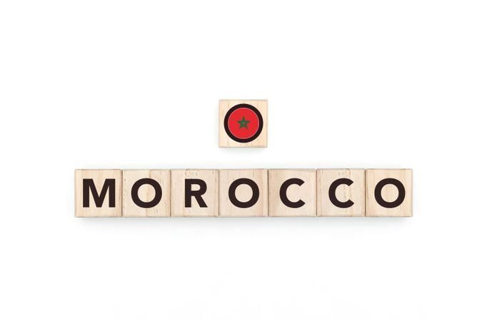 Wooden blocks bearing the name and flag of Morocco.