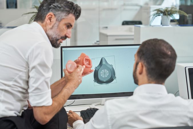 Engineers working on design of face mask