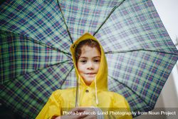 Portrait of cute little girl with umbrella on rainy day 56ZXx5