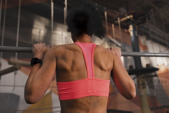 Athletic woman training in gym