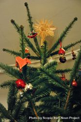 Decorated Christmas tree with ornaments indoor bGXqa0