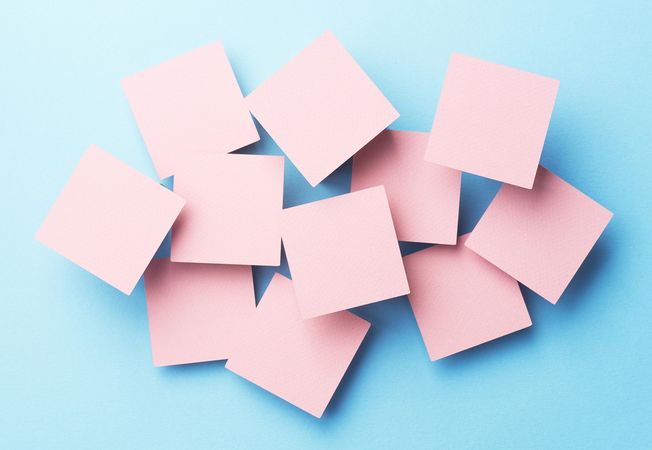 Scattered pink paper squares