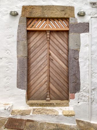 Patmian wood door with atypical design