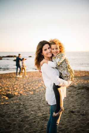 Mother with her daughter at beach