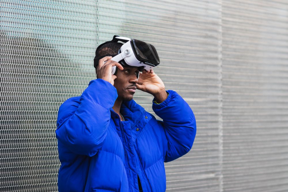 Black man experiencing virtual reality in city