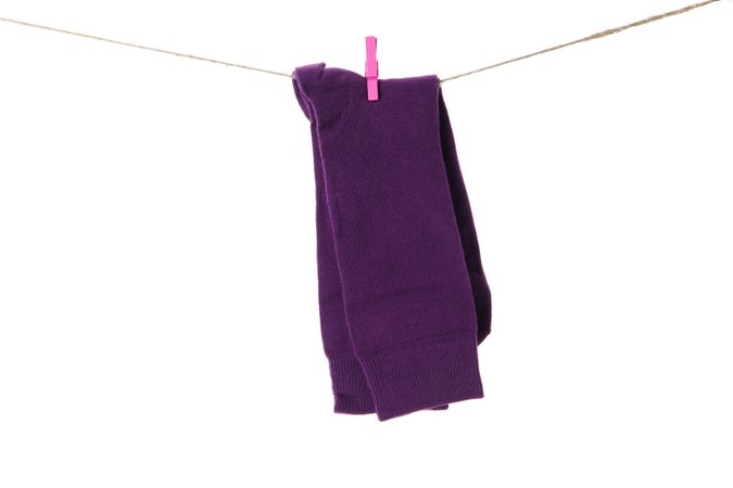 Concept of clothes for legs - socks, isolated on light background