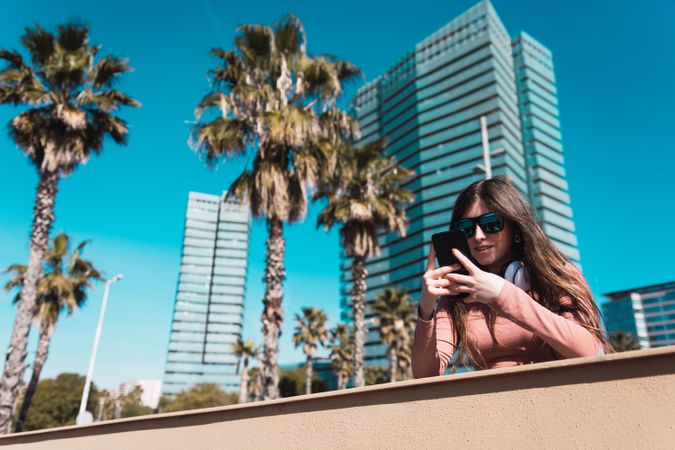 Teen girl looking at her smartphone.