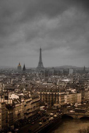 Aerial view of Paris under cloudy sky